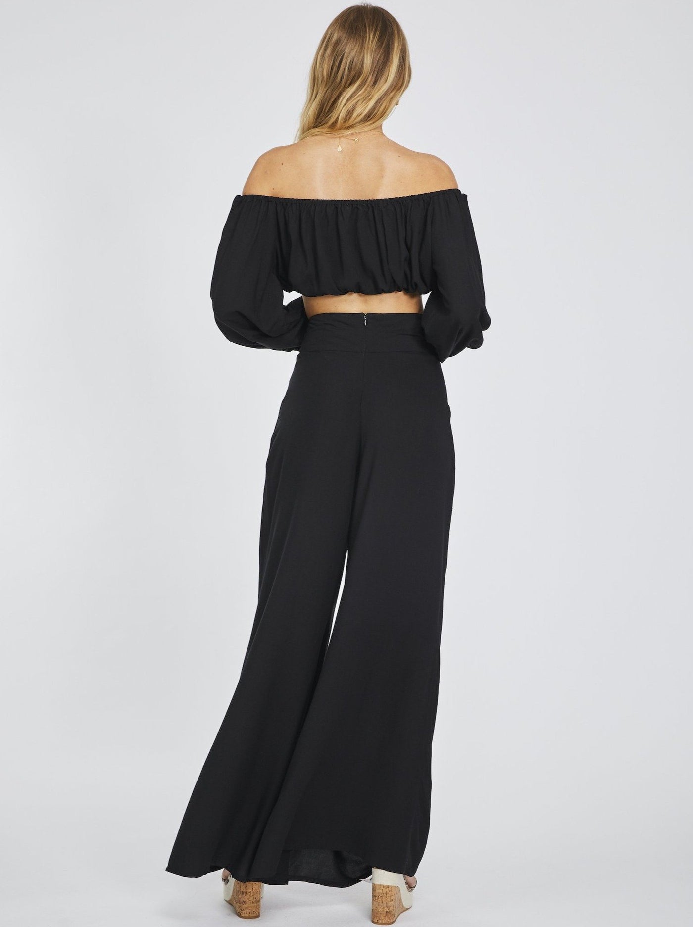 Black Palazzo Leg pants, Side Pockets, Wide Waist Panel, Inverted Pleats Under Waist Panel, Invisible Centre Back Zipper, Hook And Eye At Top Of Zipper, 100% rayon, designed in Australia
